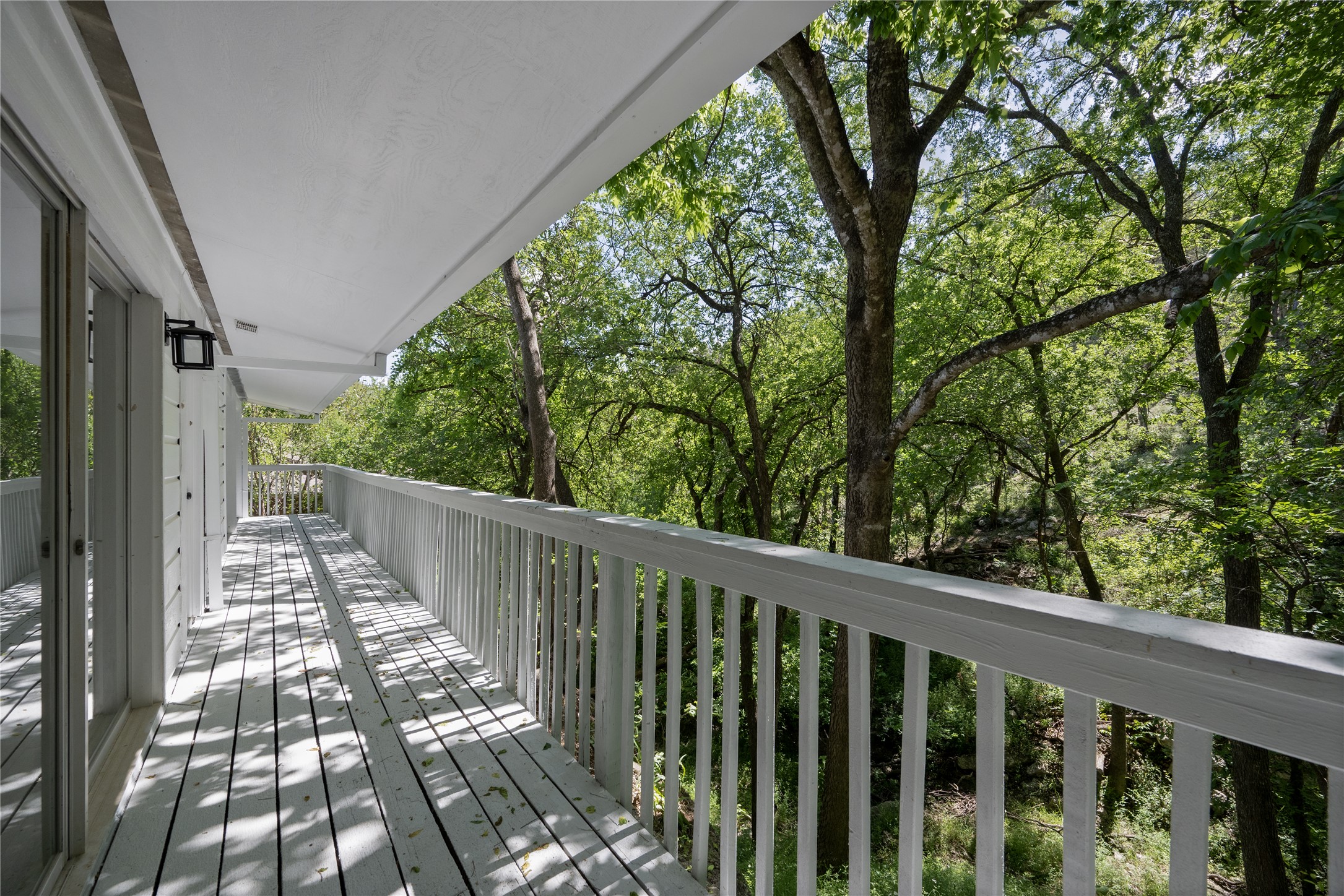 7 Hull Circle Austin, TX 78746 - Photo 14 of 14 View of wooden terrace