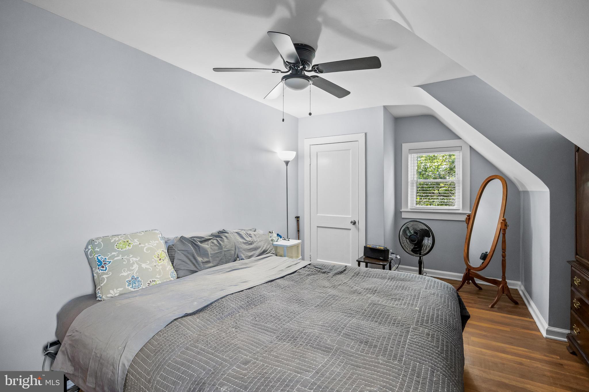120 Lejune Road Cinnaminson, NJ 08077 - Photo 17 of 23 a bedroom with a bed a window and a flat screen tv
