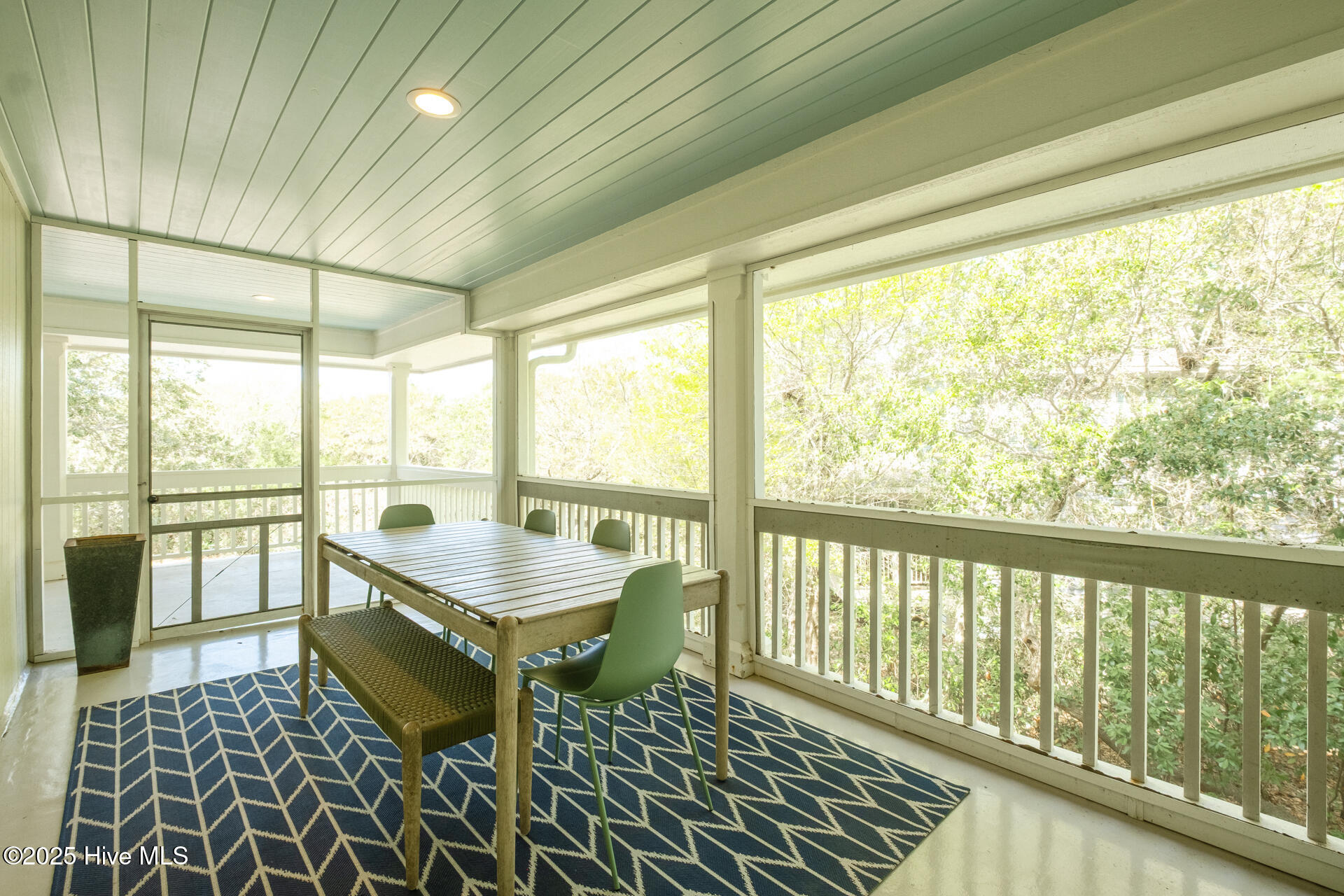 8 Racerunner Court Bald Head Island, NC 28461 - Photo 17 of 45 LOVELY DINING ON A SIDE SCREENED PORCH off GREAT ROOM