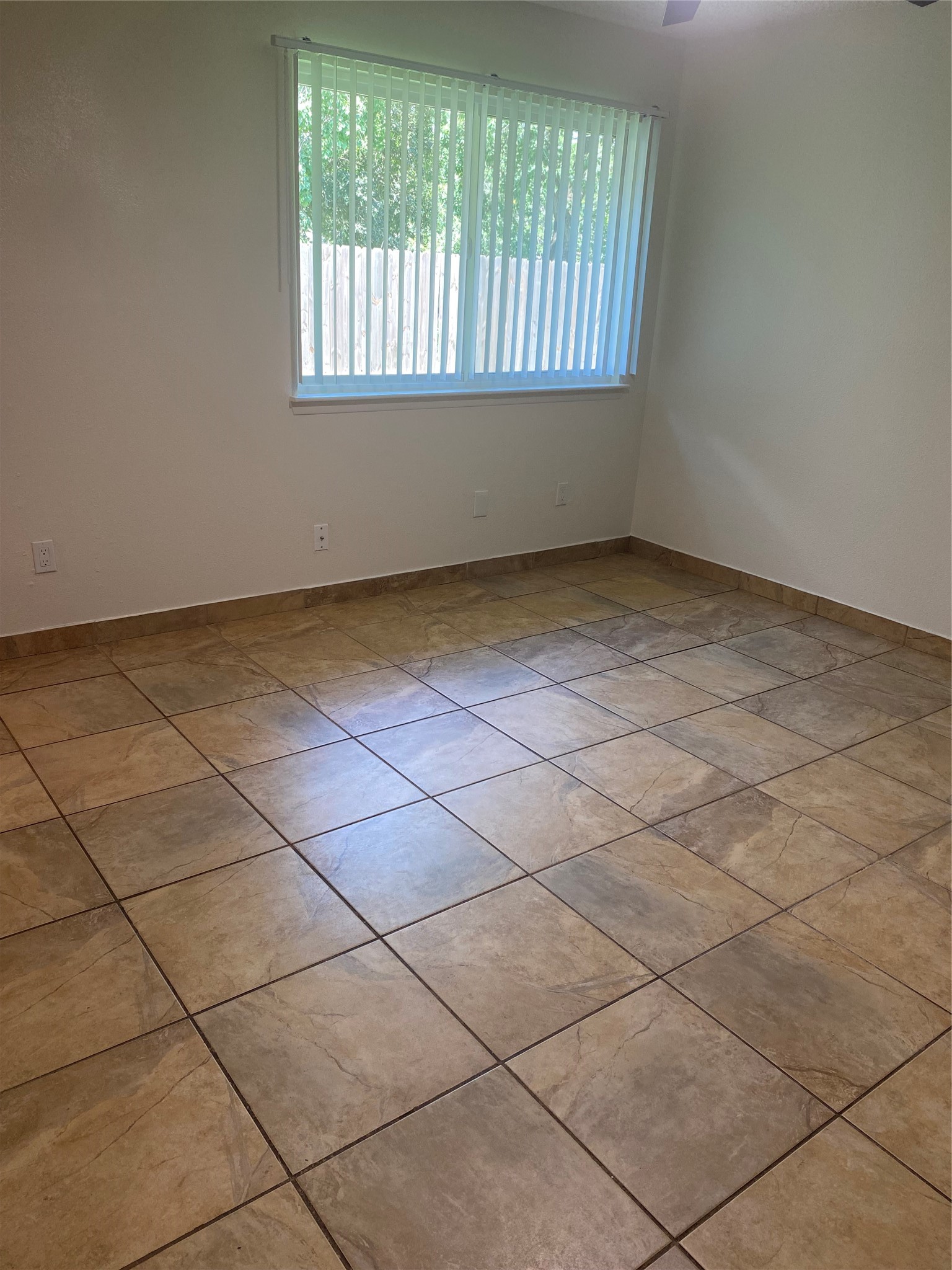 3107 Raccoon Run Spring, TX 77373 - Photo 22 of 35 Master bedroom with new vertical blinds and large porcelain floor tile