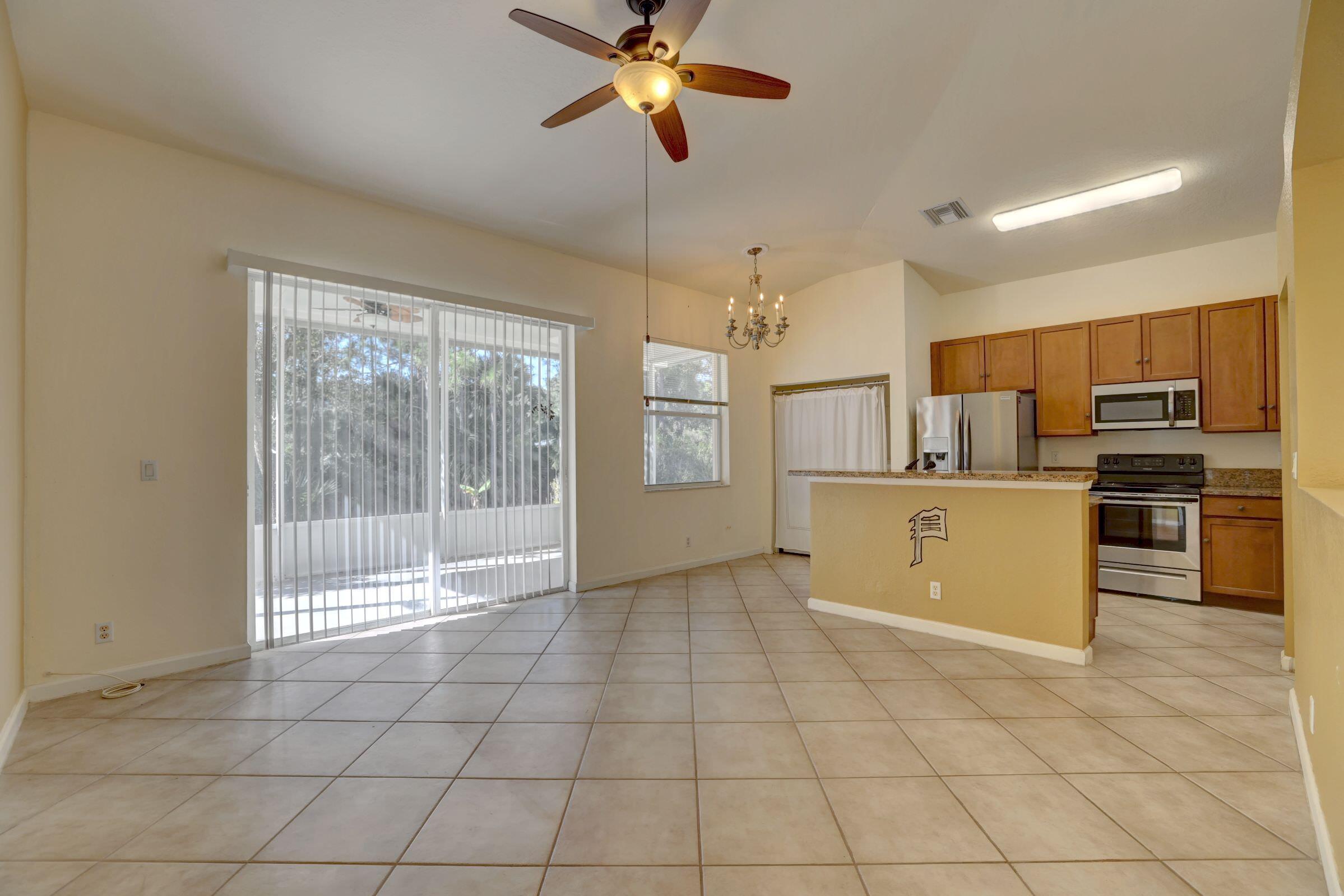 5717 Spanish River Road Fort Pierce, FL 34951 - Photo 10 of 52 Kitchen-Dining area