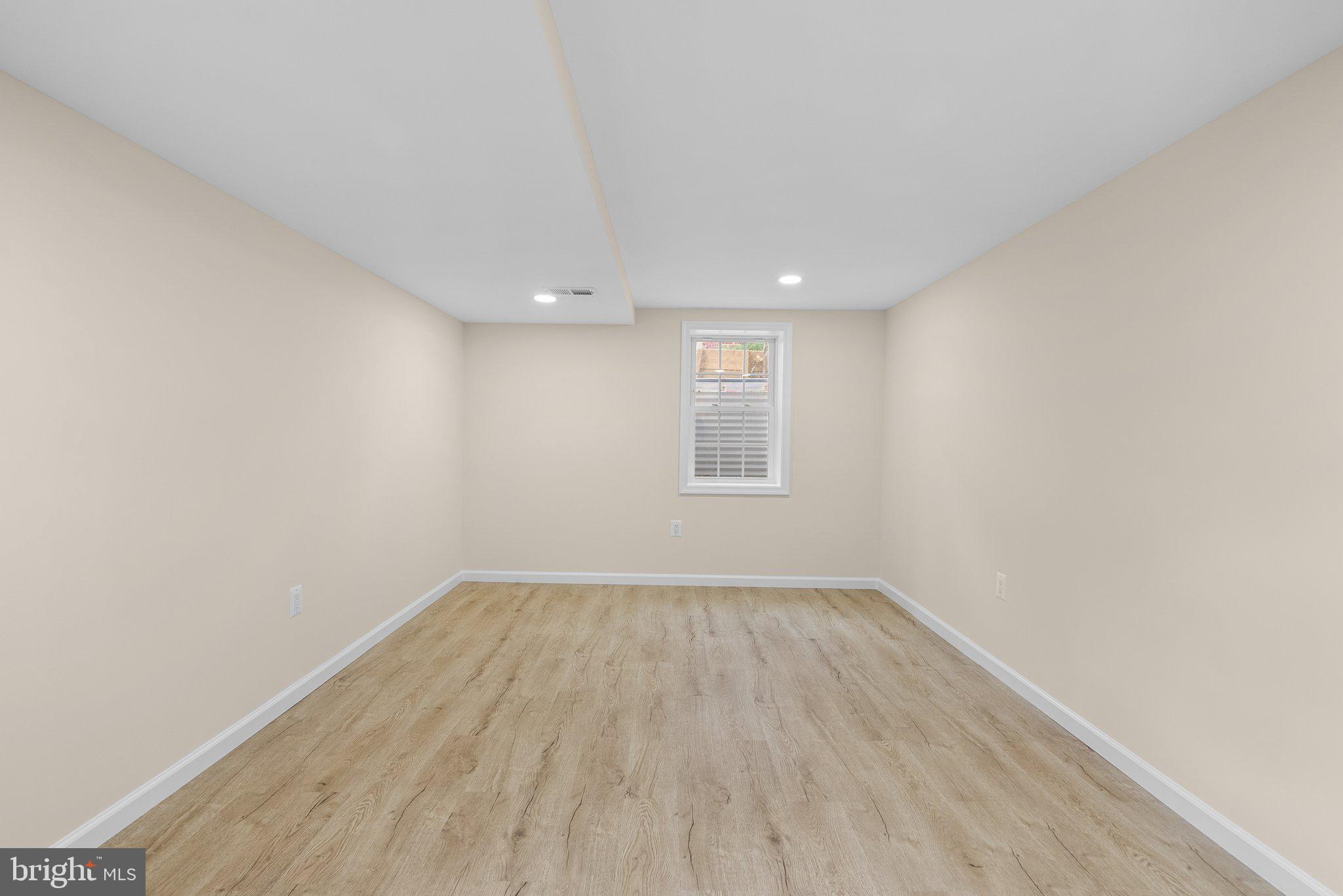 10110 McKenney Avenue Silver Spring, MD 20902 - Photo 39 of 56 an empty room with a window