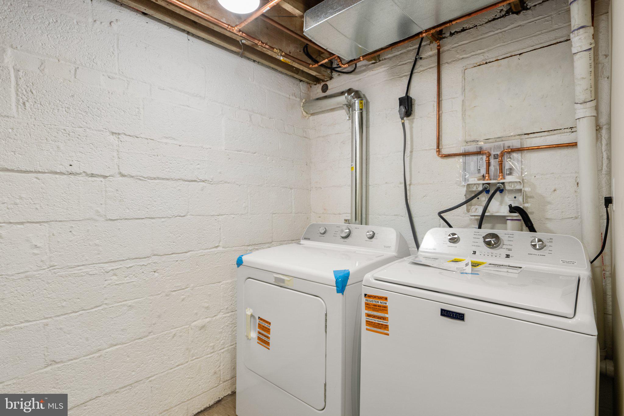 10110 McKenney Avenue Silver Spring, MD 20902 - Photo 50 of 56 a utility room with dryer and washer