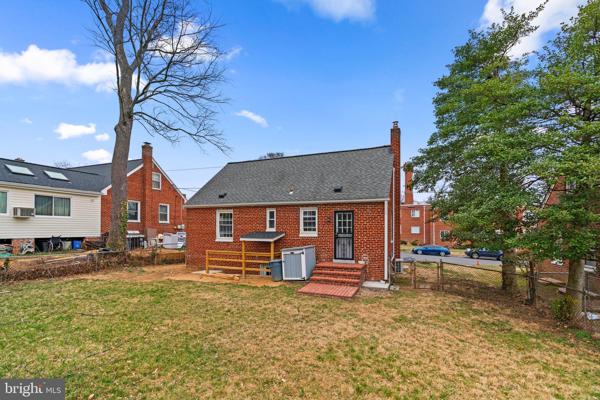 10110 McKenney Avenue Silver Spring, MD 20902 - Photo 53 of 56 a front view of a house with a yard
