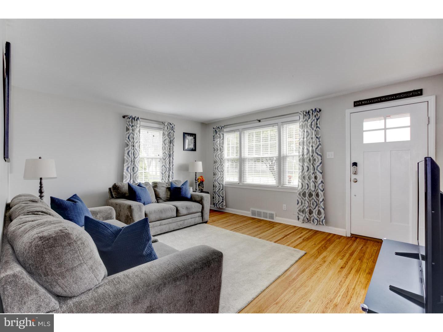 532 Lawrence Road Havertown, PA 19083 - Photo 3 of 22 a living room with furniture and a flat screen tv