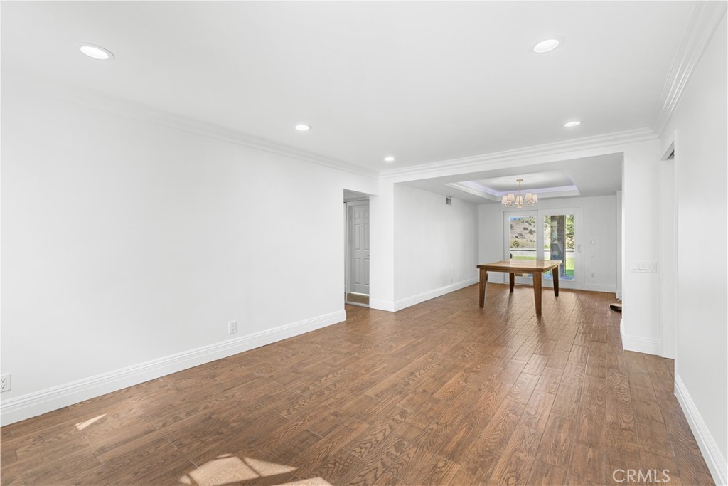 26096 Adamor Road Calabasas, CA 91302 - Photo 13 of 61 View from foyer into living room with dining room in the distance.