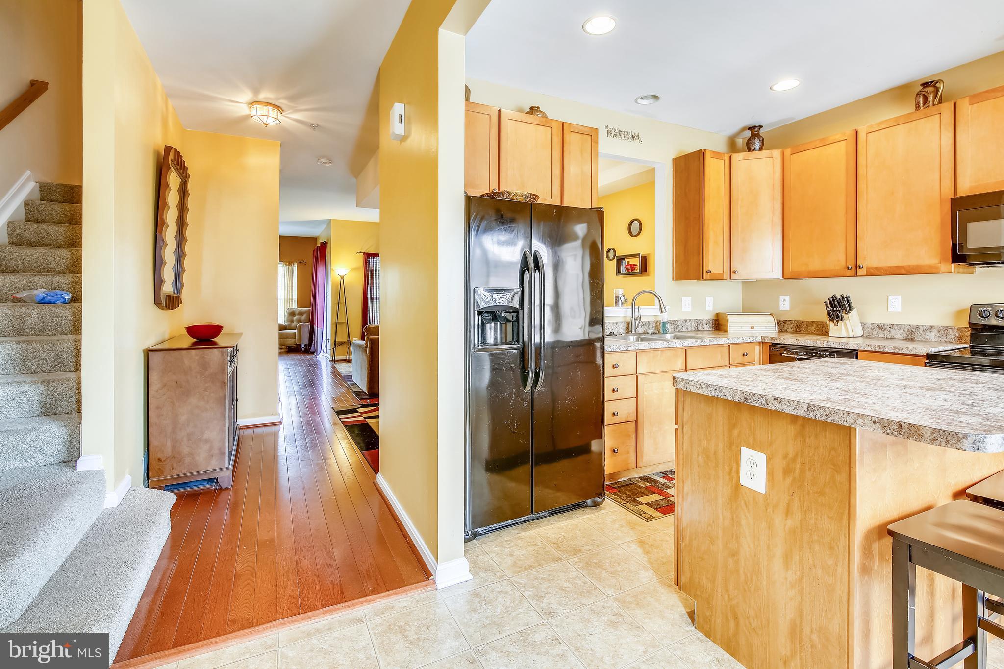 1924 Waltman Road Edgewood, MD 21040 - Photo 2 of 33 a kitchen with stainless steel appliances granite countertop a refrigerator and a sink