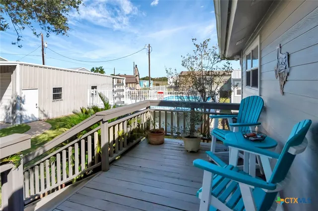 a view of balcony deck and patio