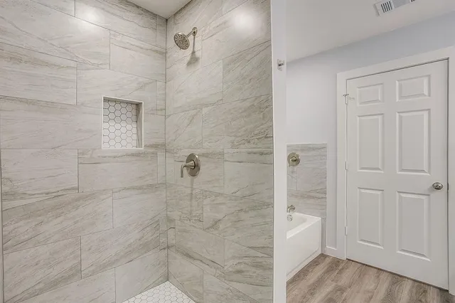 a bathroom with a bathtub