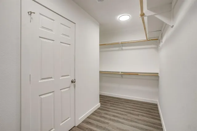a view of an empty walk in closet