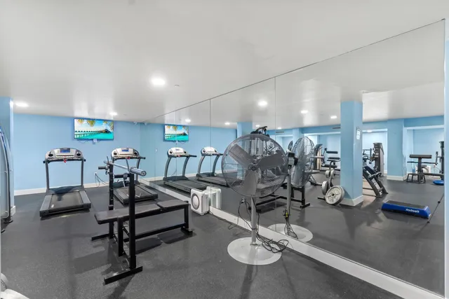 a view of a room with gym equipment