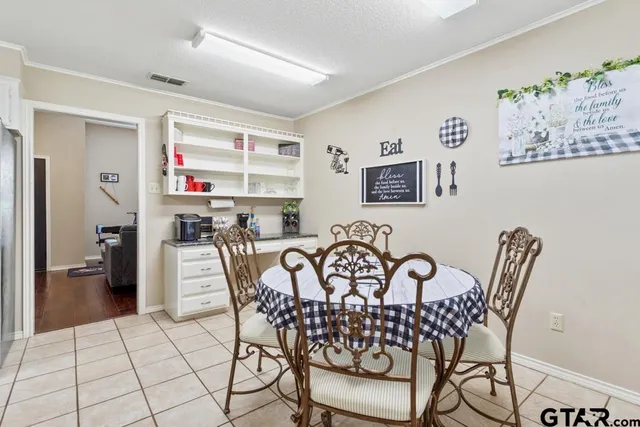 a view of a dining room with furniture