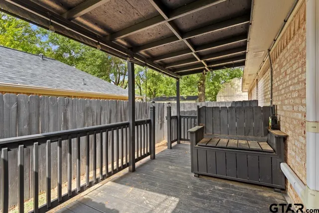 a view of outdoor space with wooden deck