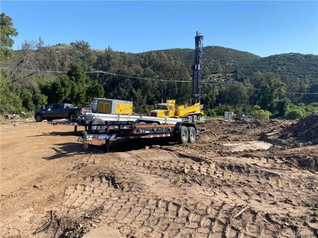 a view of swimming pool with a patio