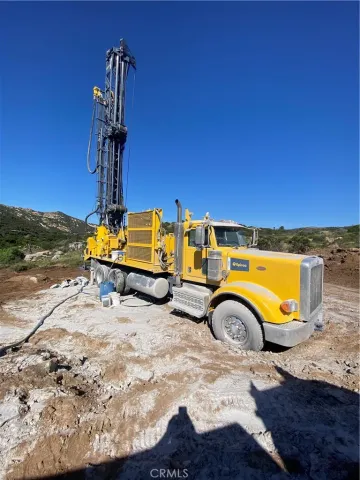 a view of a swimming pool with a lounge chair