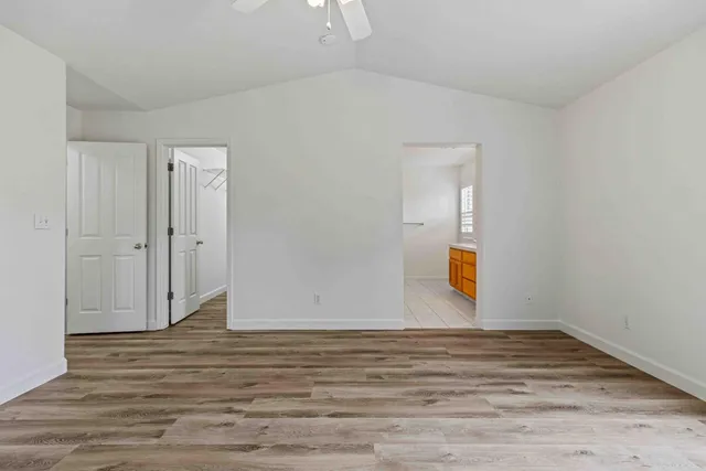 a view of an empty walk in closet