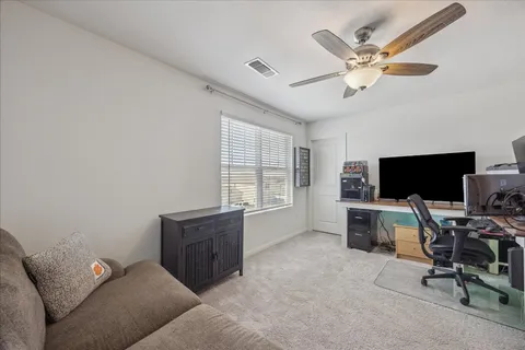 a living room with furniture and a couch