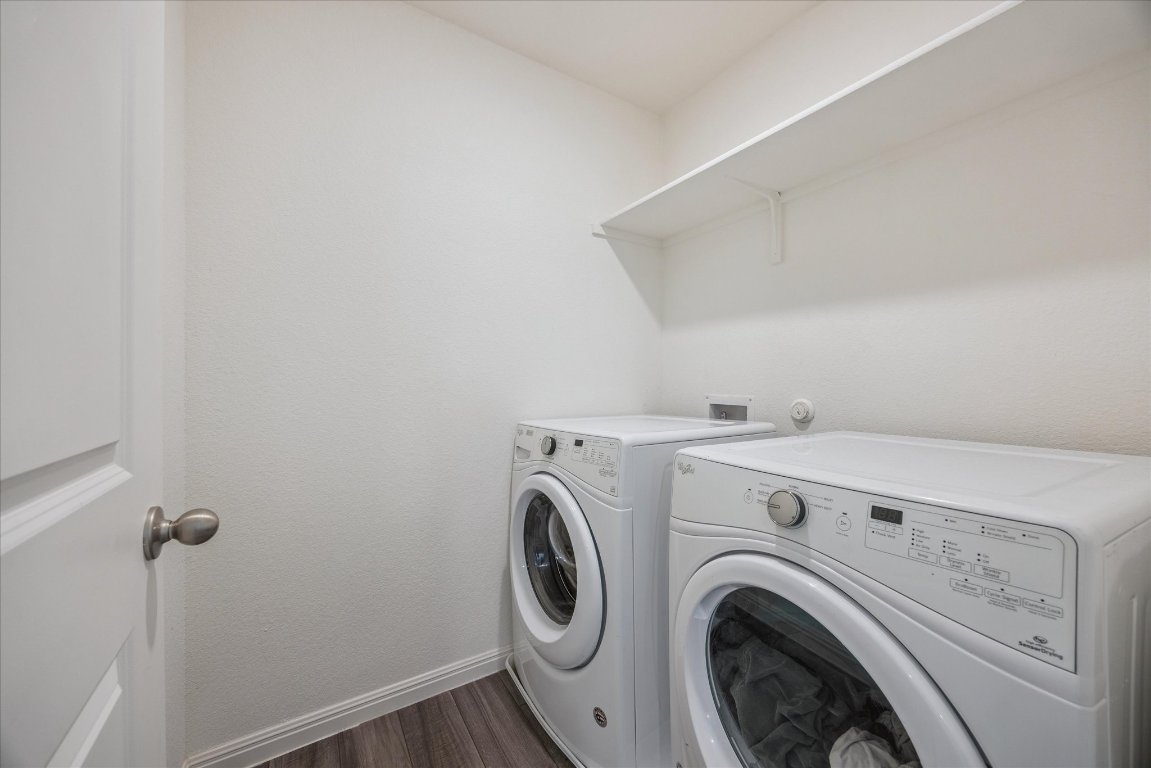 208 Night Riders Way Jarrell, TX 76537 - Photo 25 of 31 a view of storage and utility room with washer and dryer