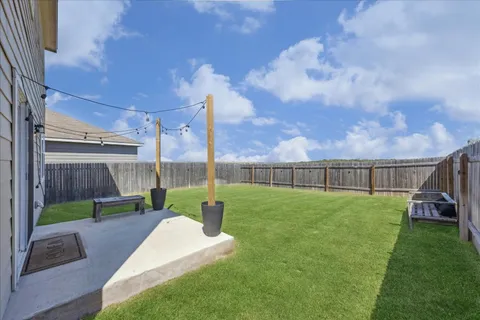 a view of storage and utility room with washer and dryer
