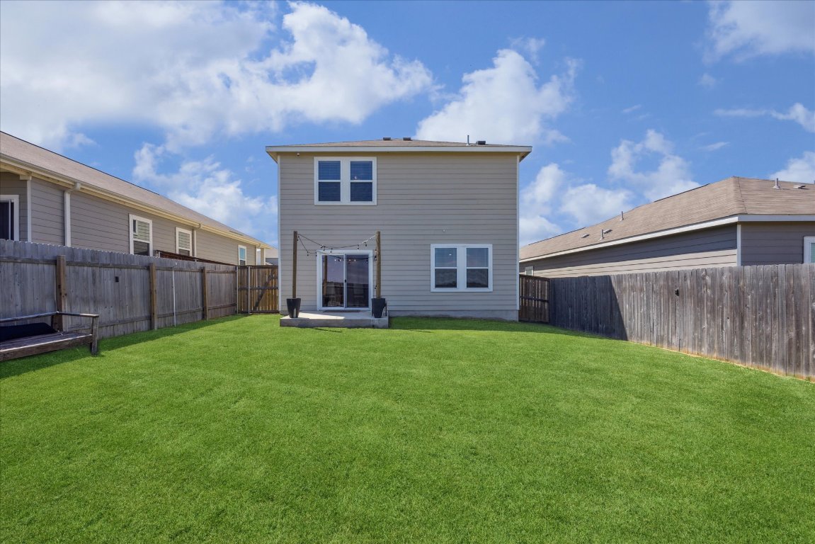 208 Night Riders Way Jarrell, TX 76537 - Photo 28 of 31 a view of a back yard of the house