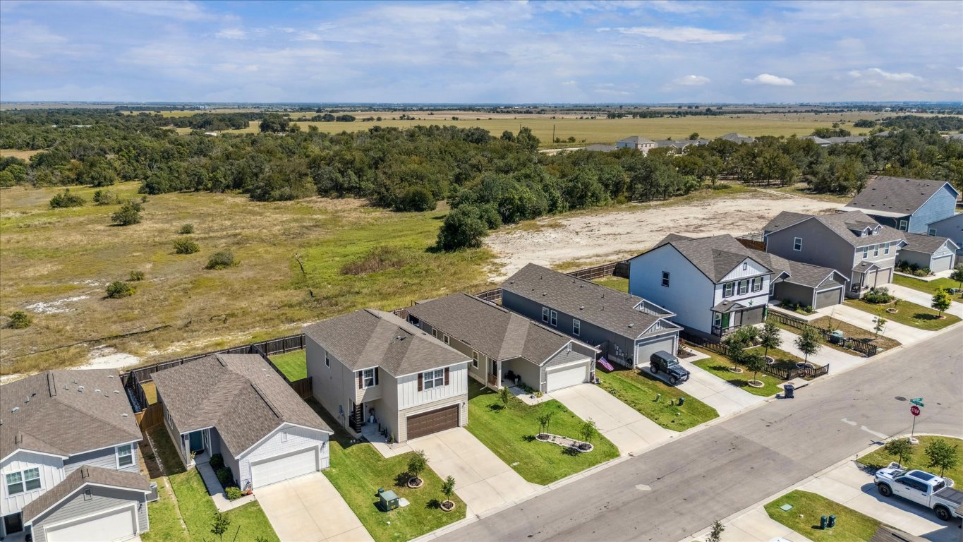 208 Night Riders Way Jarrell, TX 76537 - Photo 29 of 31 an aerial view of residential houses with outdoor space