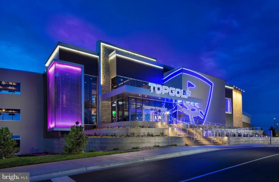 18520 Kingshill Road Germantown, MD 20874 - Photo 14 of 15 Vibrant night at Topgolf venue.