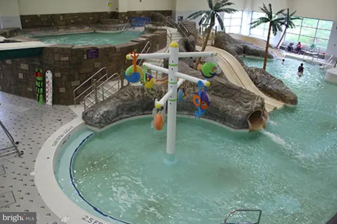 18520 Kingshill Road Germantown, MD 20874 - Photo 10 of 15 Tropical oasis with fun water features.