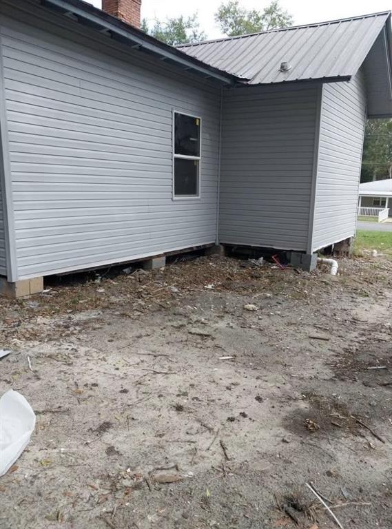 2859 Orange Street Marianna, FL 32448 - Photo 4 of 9 a backyard of a house