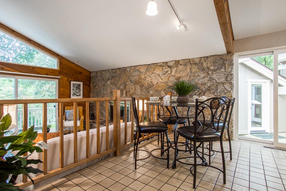661 Sugar Pine Road Scotts Valley, CA 95066 - Photo 12 of 40 a view of a chairs and table in the balcony
