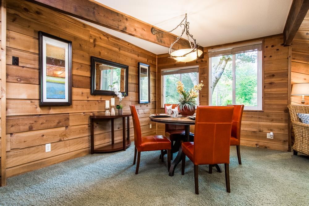 661 Sugar Pine Road Scotts Valley, CA 95066 - Photo 13 of 40 a dining room with furniture a chandelier and a rug