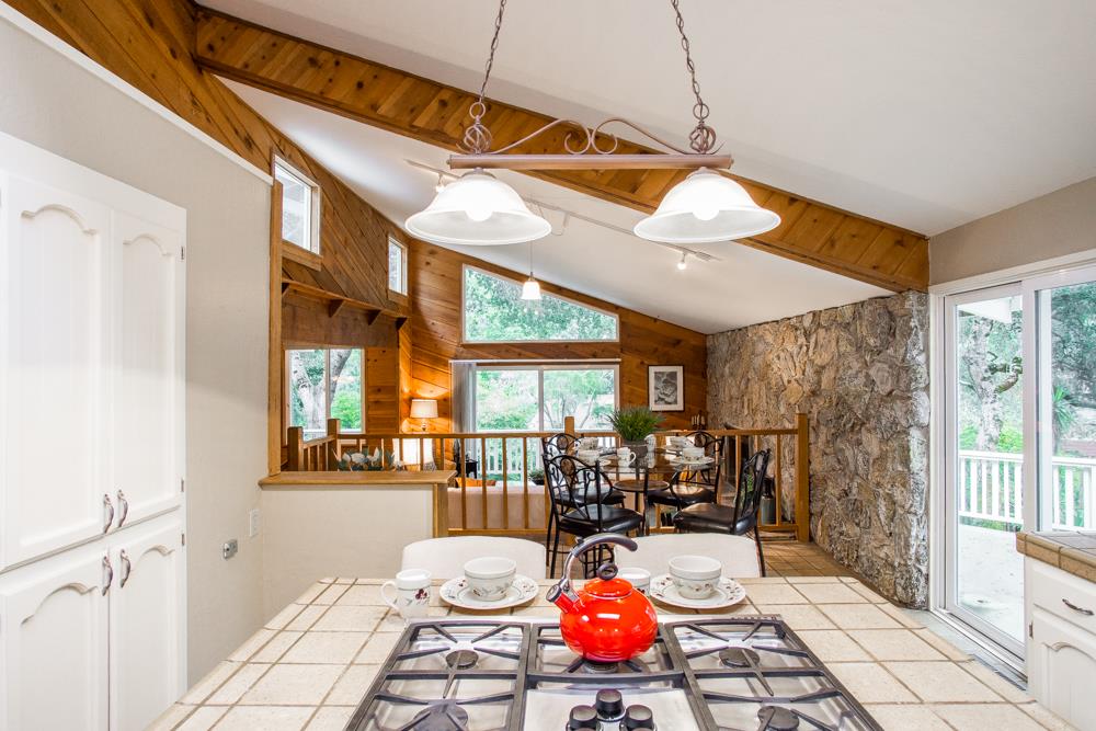 661 Sugar Pine Road Scotts Valley, CA 95066 - Photo 16 of 40 a view of a dining room and hall with furniture