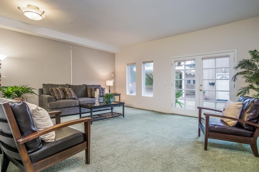 661 Sugar Pine Road Scotts Valley, CA 95066 - Photo 17 of 40 a living room with furniture and a window