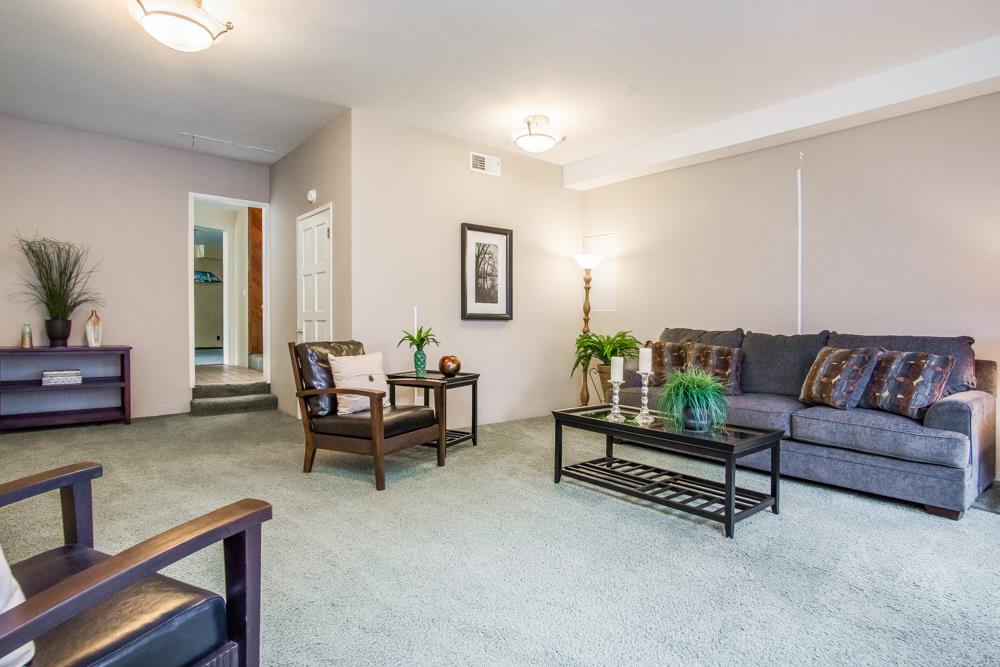 661 Sugar Pine Road Scotts Valley, CA 95066 - Photo 18 of 40 a living room with furniture and wooden floor