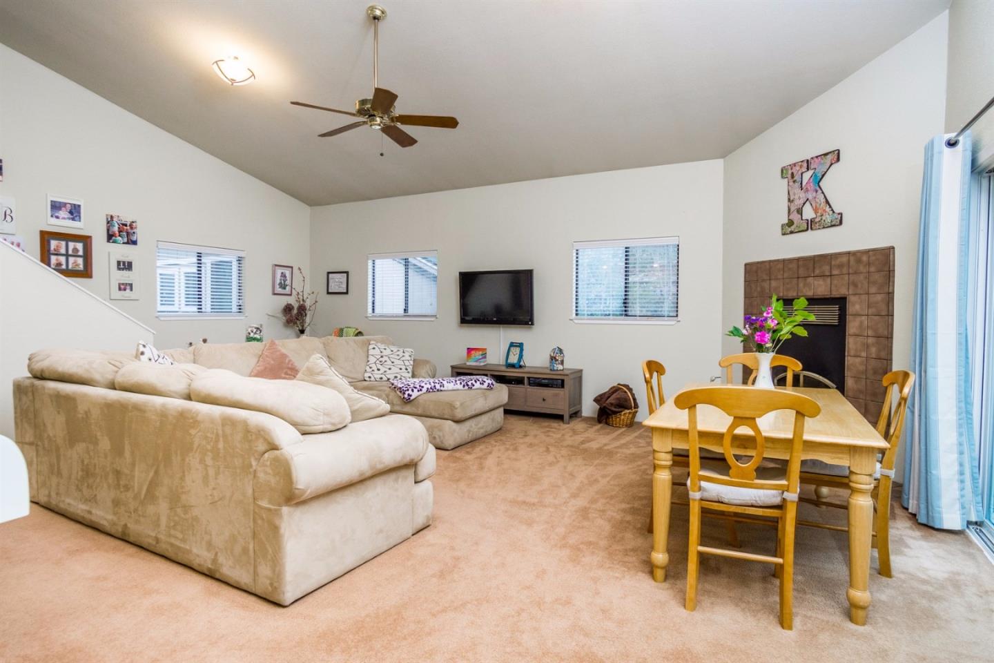 661 Sugar Pine Road Scotts Valley, CA 95066 - Photo 28 of 40 a living room with furniture and a flat screen tv