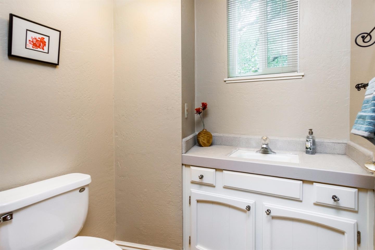 661 Sugar Pine Road Scotts Valley, CA 95066 - Photo 33 of 40 a bathroom with a sink and a toilet