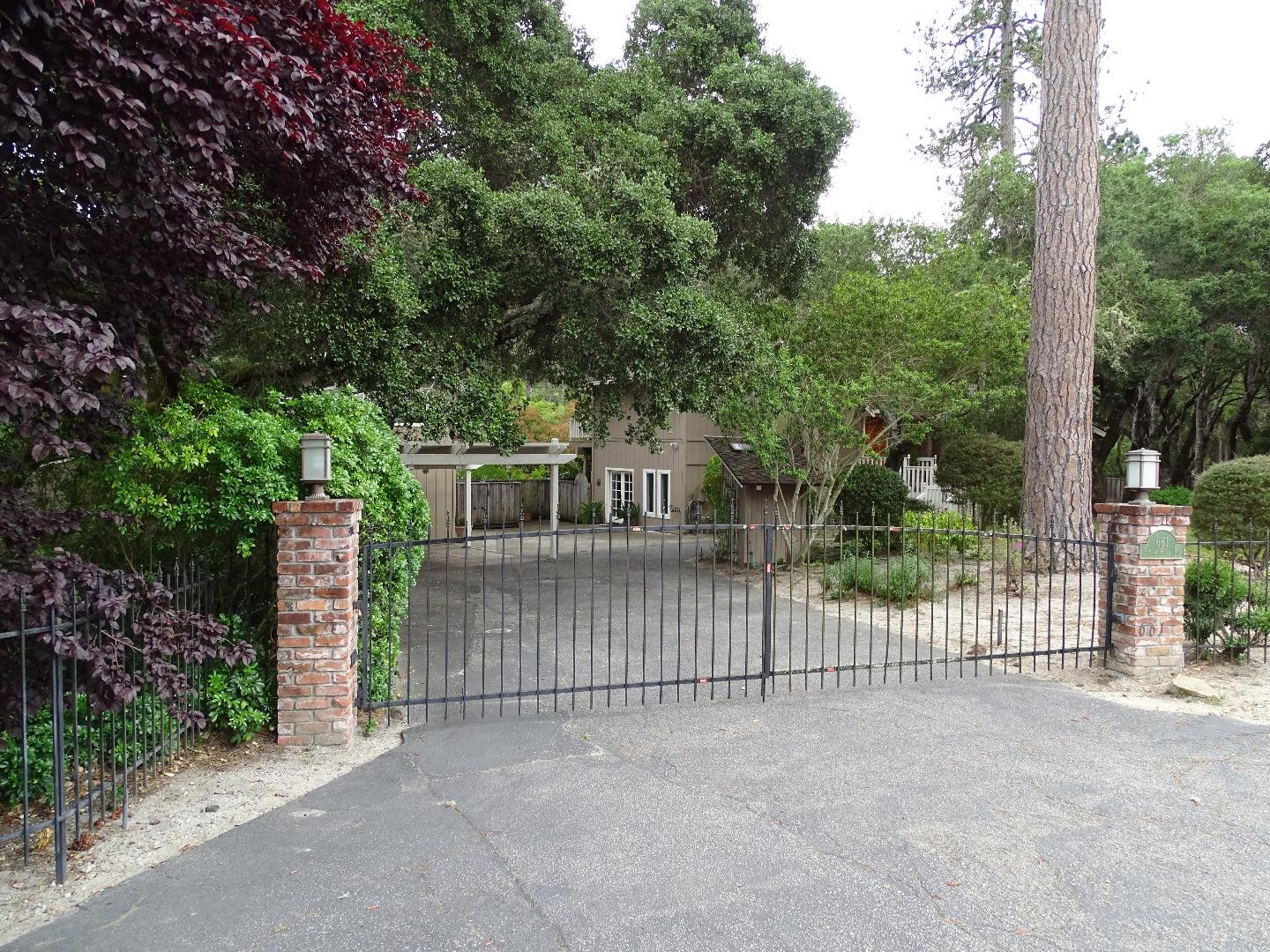 661 Sugar Pine Road Scotts Valley, CA 95066 - Photo 38 of 40 a view of a house with a fence and a tree