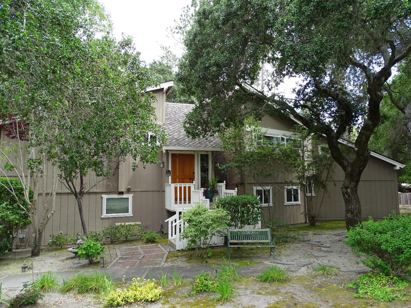 661 Sugar Pine Road Scotts Valley, CA 95066 - Photo 4 of 40 a front view of a house with garden