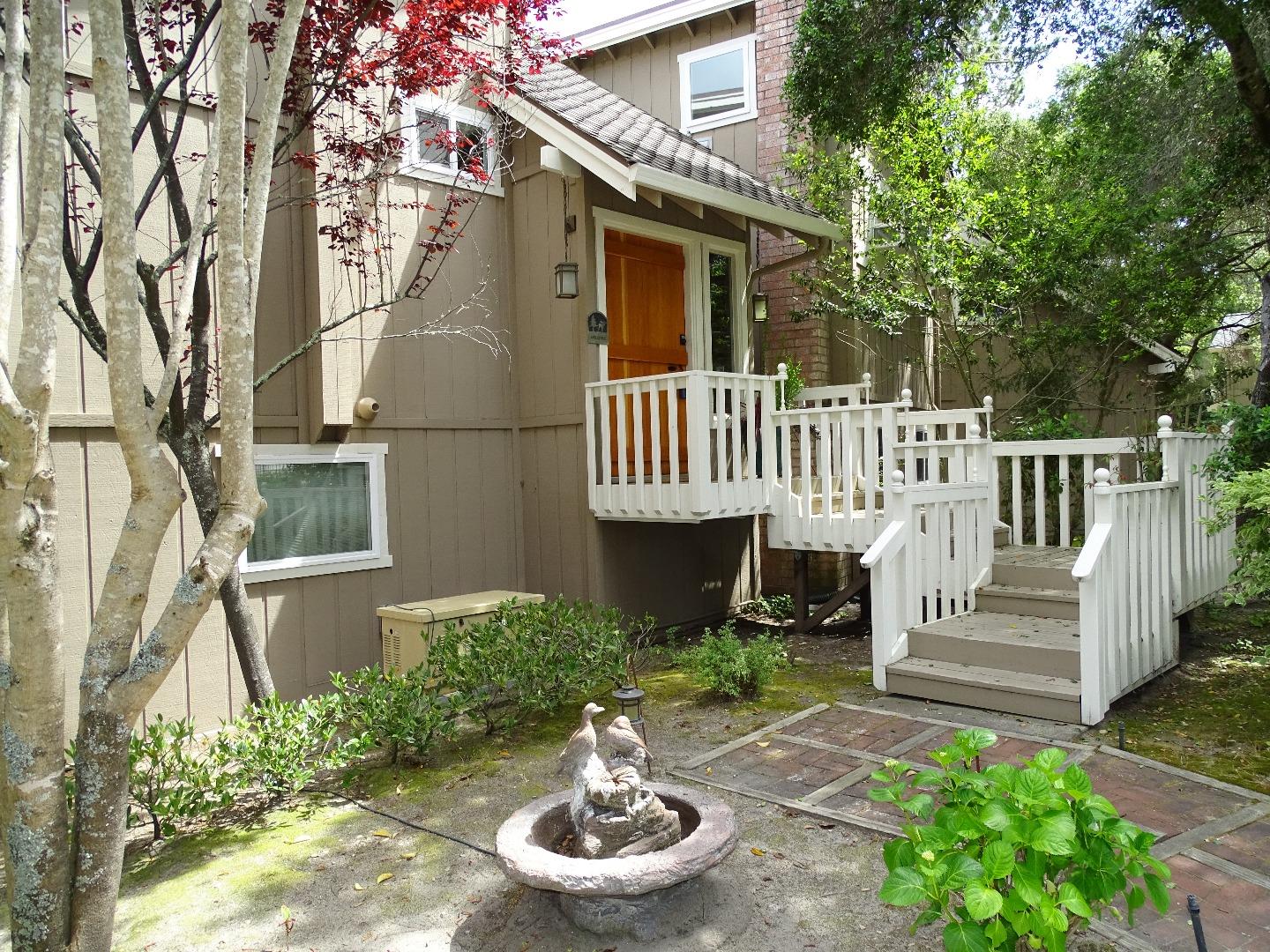 661 Sugar Pine Road Scotts Valley, CA 95066 - Photo 5 of 40 a house with lots of trees in the background