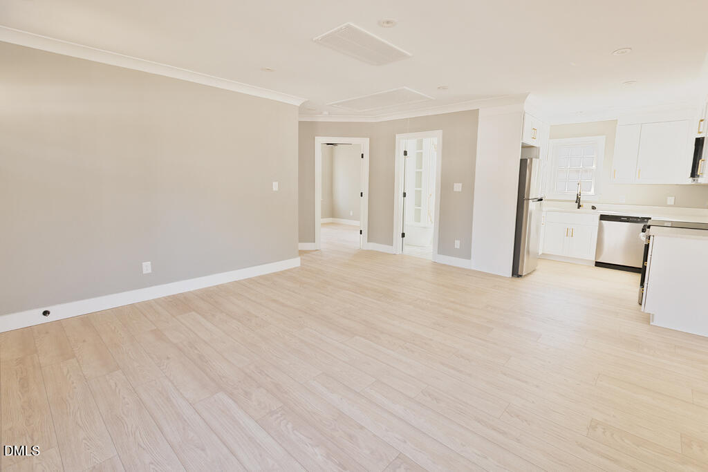 917 Gold Street North Wilson, NC 27893 - Photo 20 of 41 a view of empty room with kitchen and window