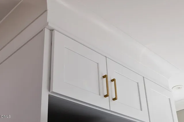 a bathroom with a bathtub sink and mirror