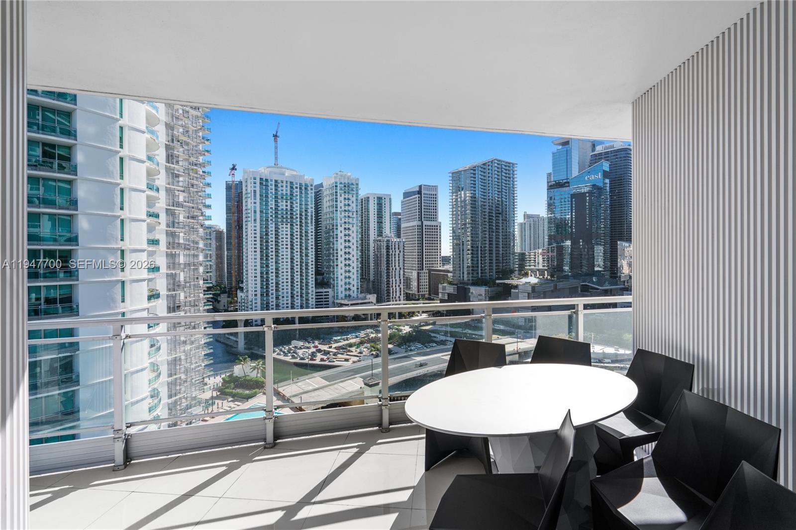 90 Southwest 3rd Street, Unit 2204 Miami, FL 33130 - Photo 38 of 51 a bathroom with a sink and a mirror