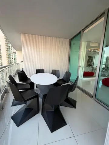 a view of a living room with furniture
