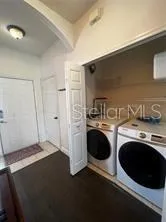 a kitchen with stainless steel appliances a stove a refrigerator and a sink