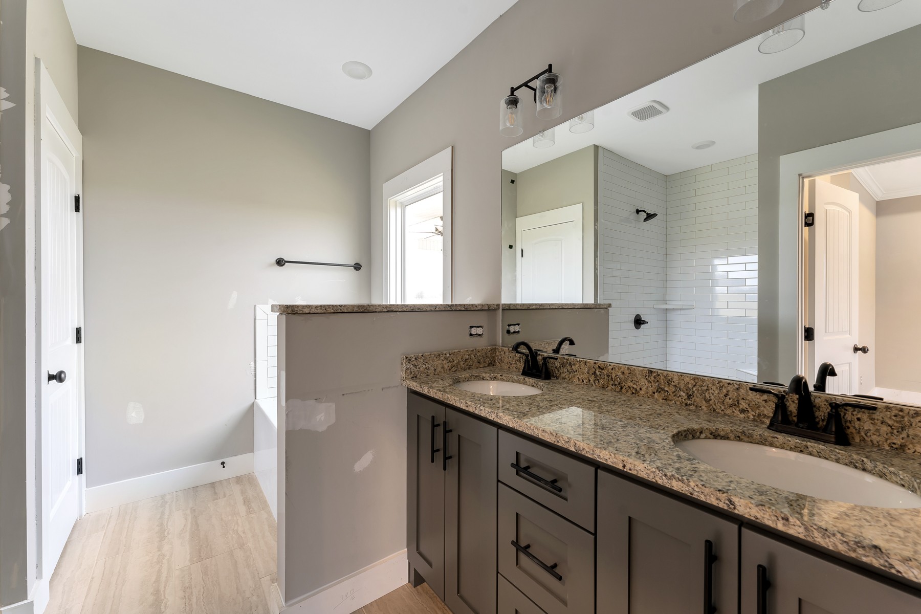 4901 Barren Plains Road Springfield, TN 37172 - Photo 11 of 15 a bathroom with a granite countertop sink and a mirror