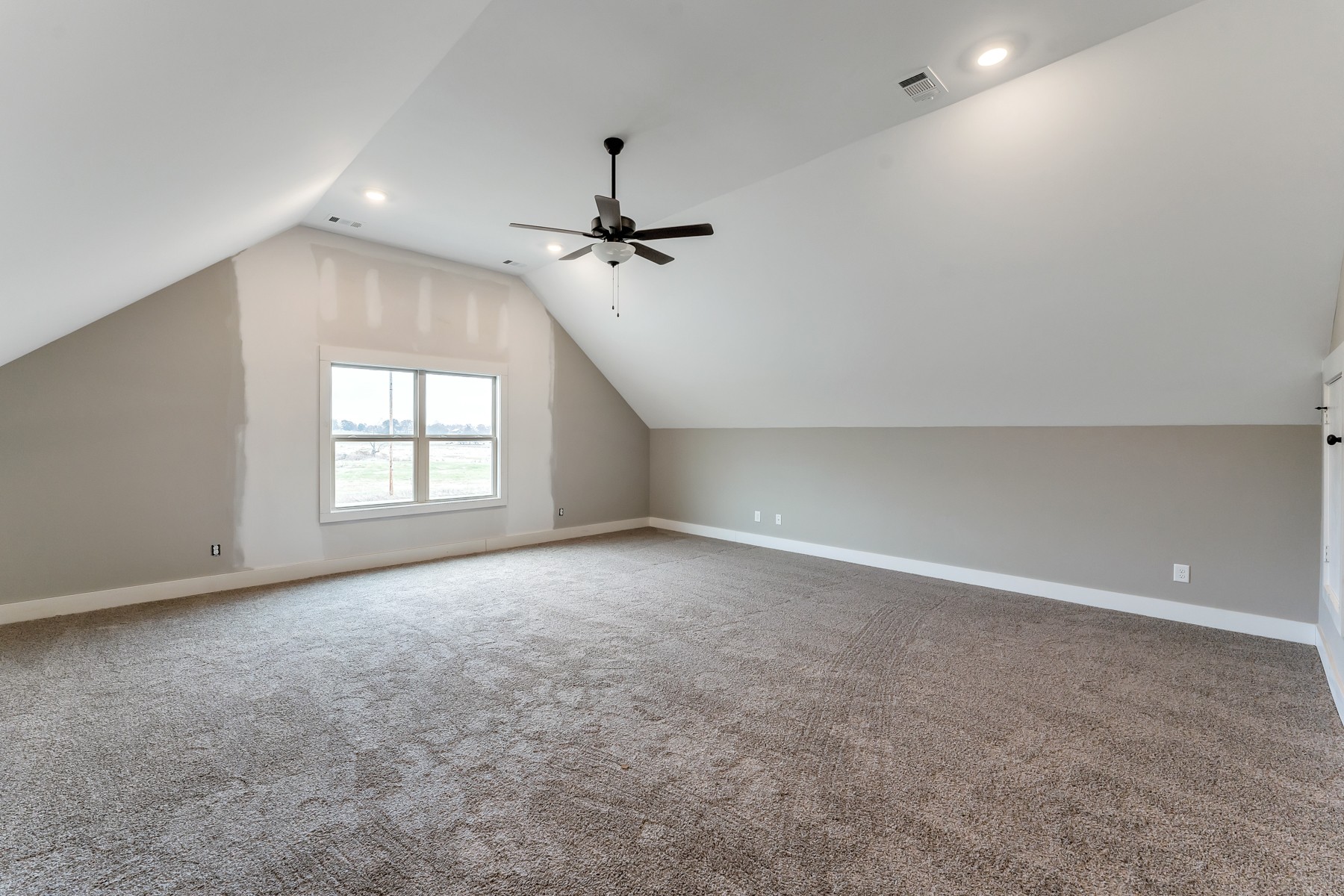 4901 Barren Plains Road Springfield, TN 37172 - Photo 13 of 15 an empty room with windows and chandelier fan