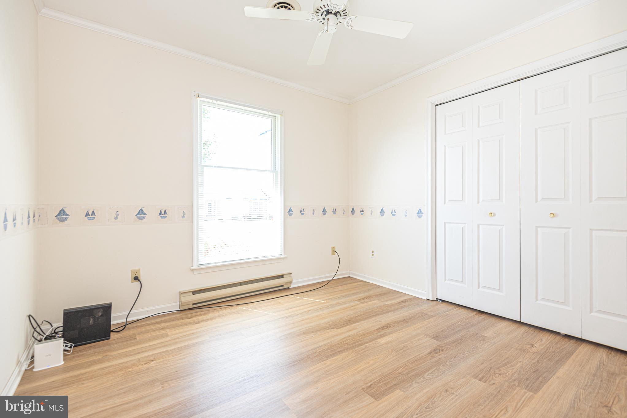 38241 Marlington Road Ocean View, DE 19970 - Photo 18 of 40 a view of an empty room with a window