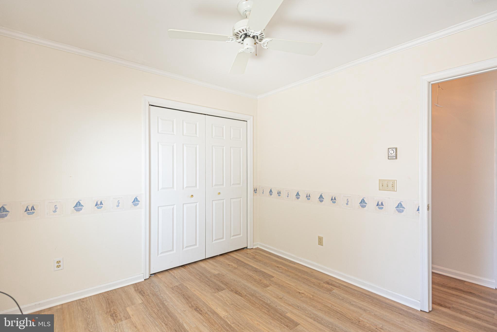 38241 Marlington Road Ocean View, DE 19970 - Photo 19 of 40 wooden floor in an empty room