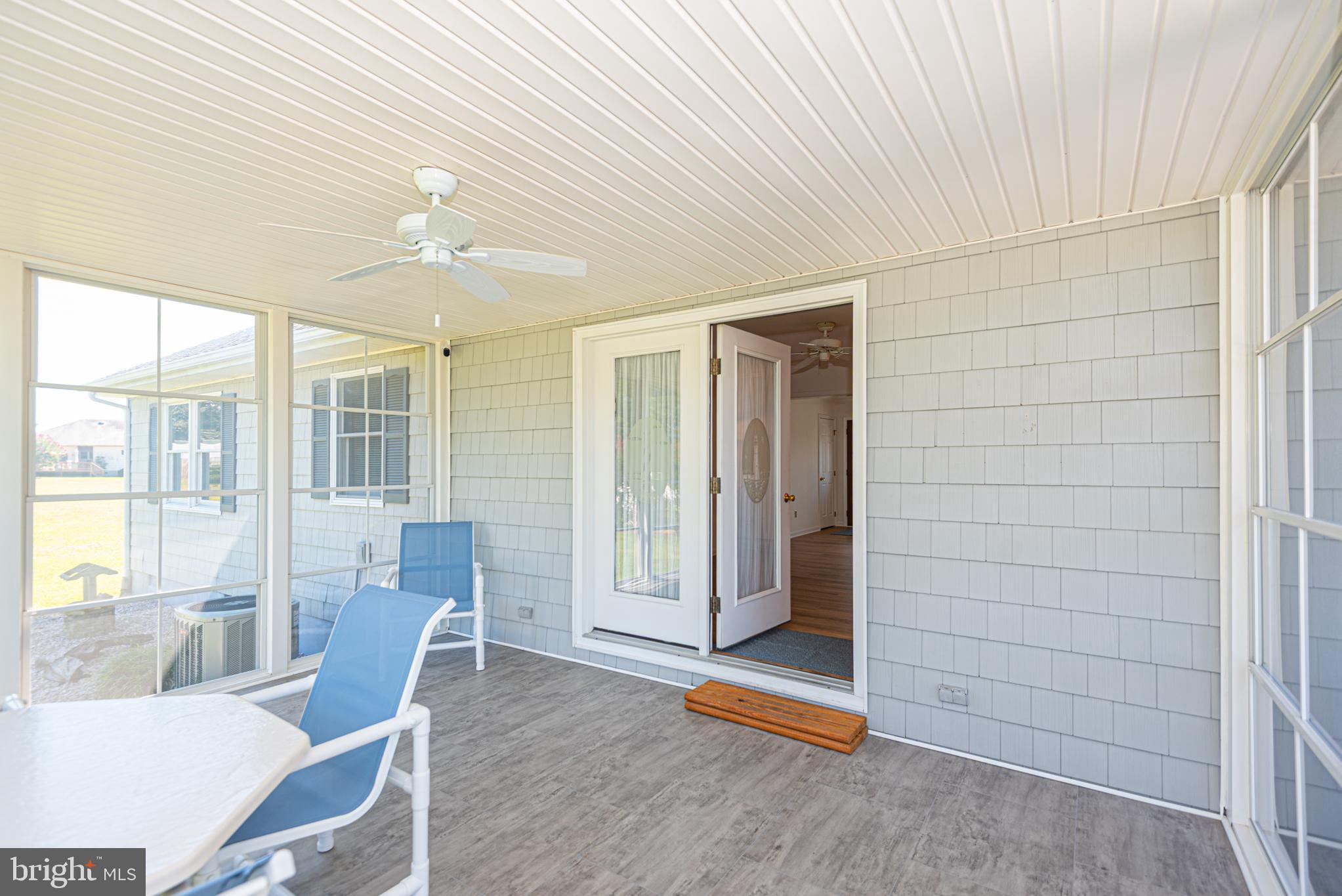 38241 Marlington Road Ocean View, DE 19970 - Photo 24 of 40 a view of a livingroom with furniture and windows