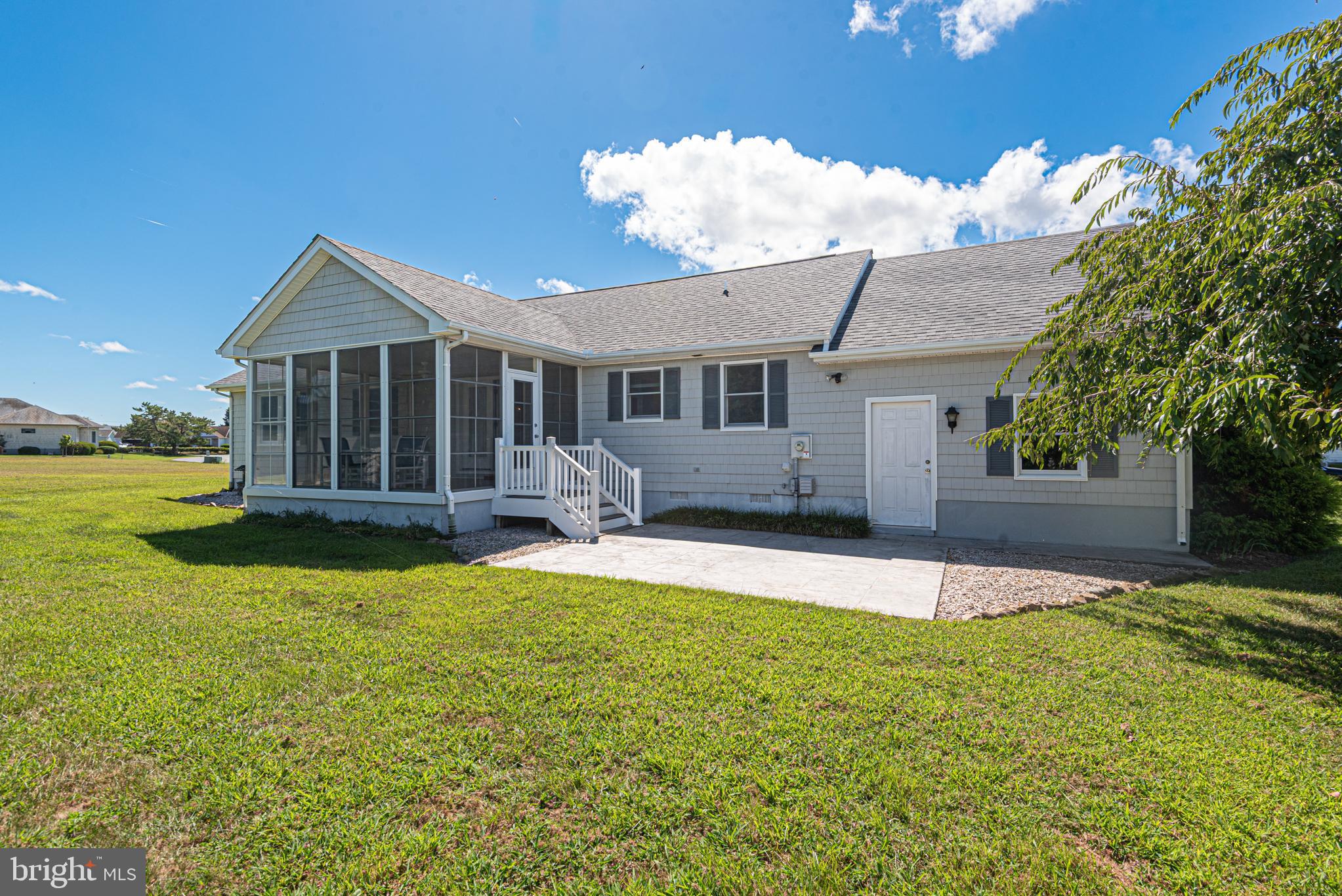 38241 Marlington Road Ocean View, DE 19970 - Photo 29 of 40 a view of a house with a yard and garage