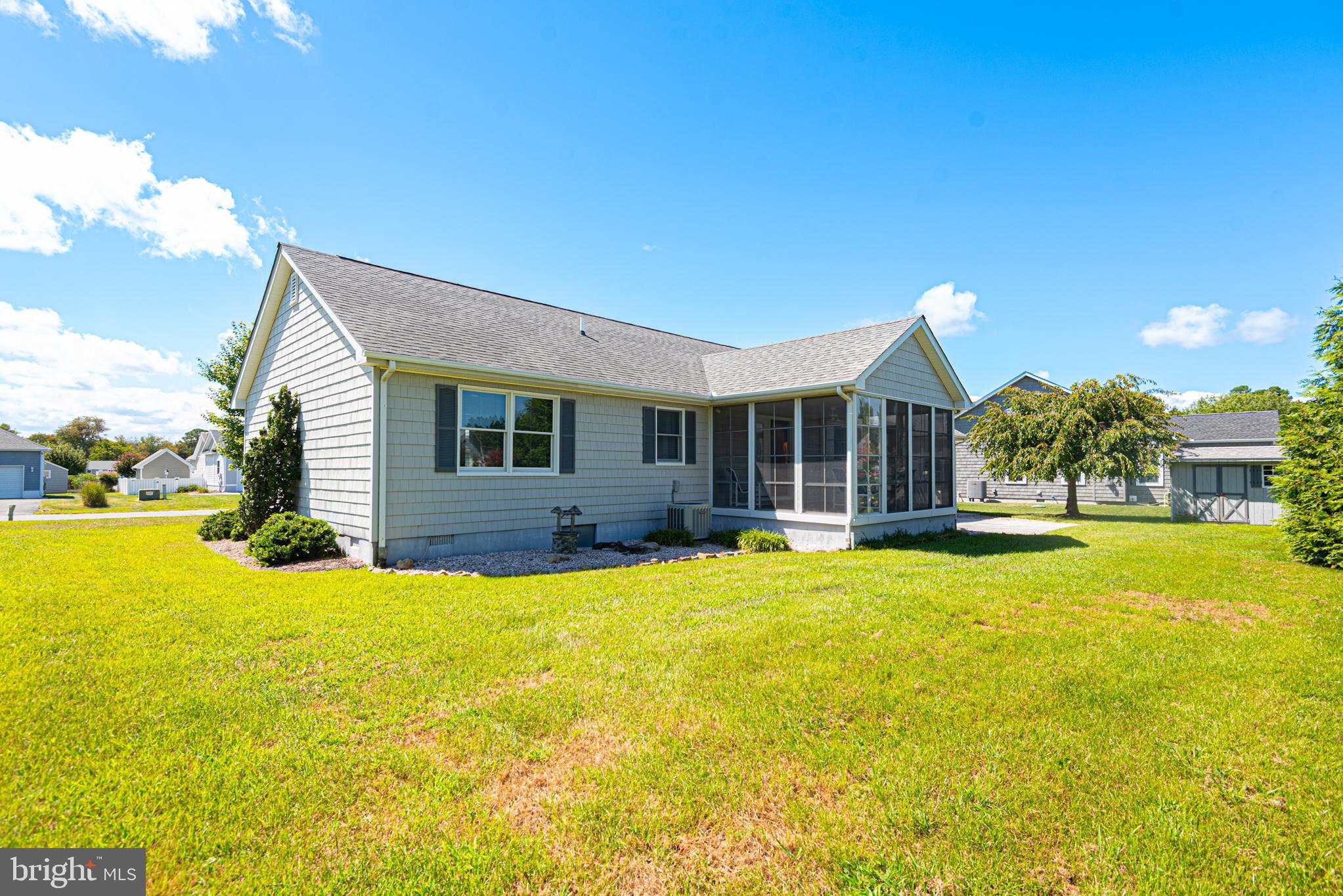 38241 Marlington Road Ocean View, DE 19970 - Photo 30 of 40 a view of a house with swimming pool and a yard